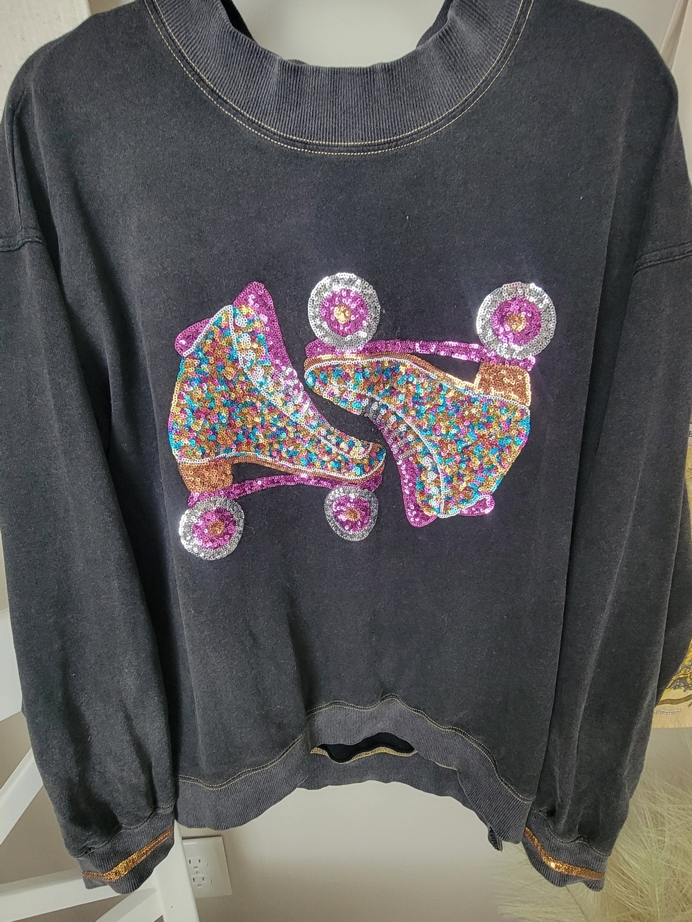 white birch Black Crewneck Sweater with Sequin Roller Skate Motif